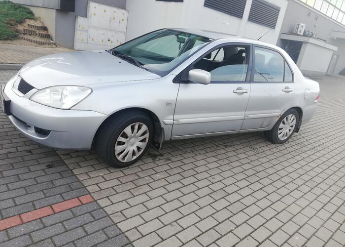 Grajewo ogłoszenia: Witam serdecznie posiadam na sprzedanie mitsubishi Lancer 1.6 gaz...